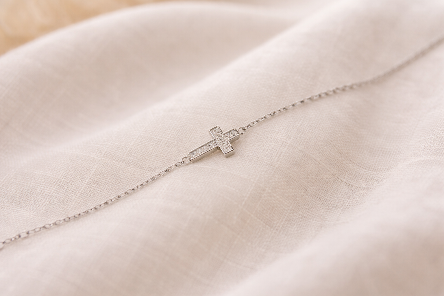 Held Cross Bracelet