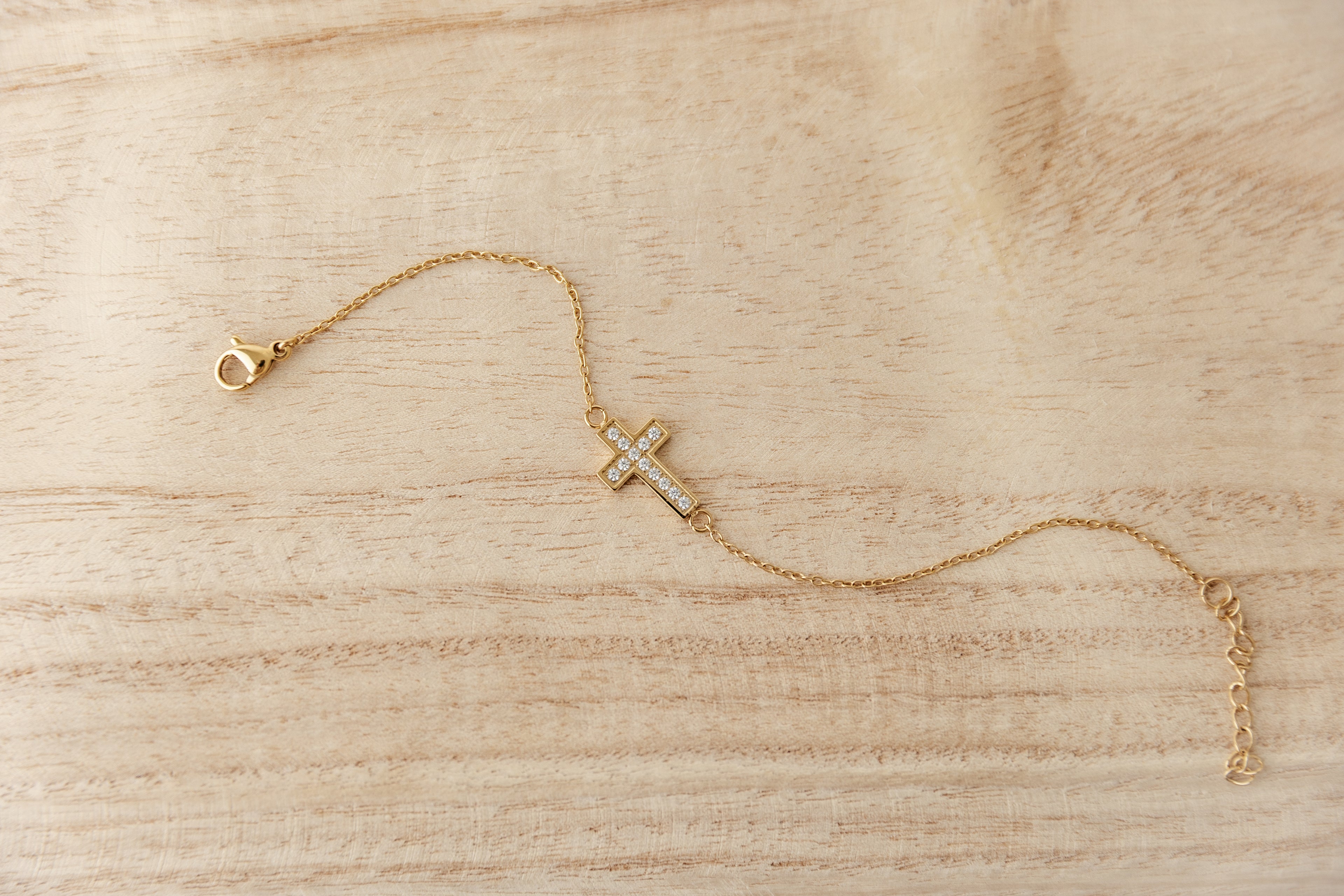 Held Cross Bracelet